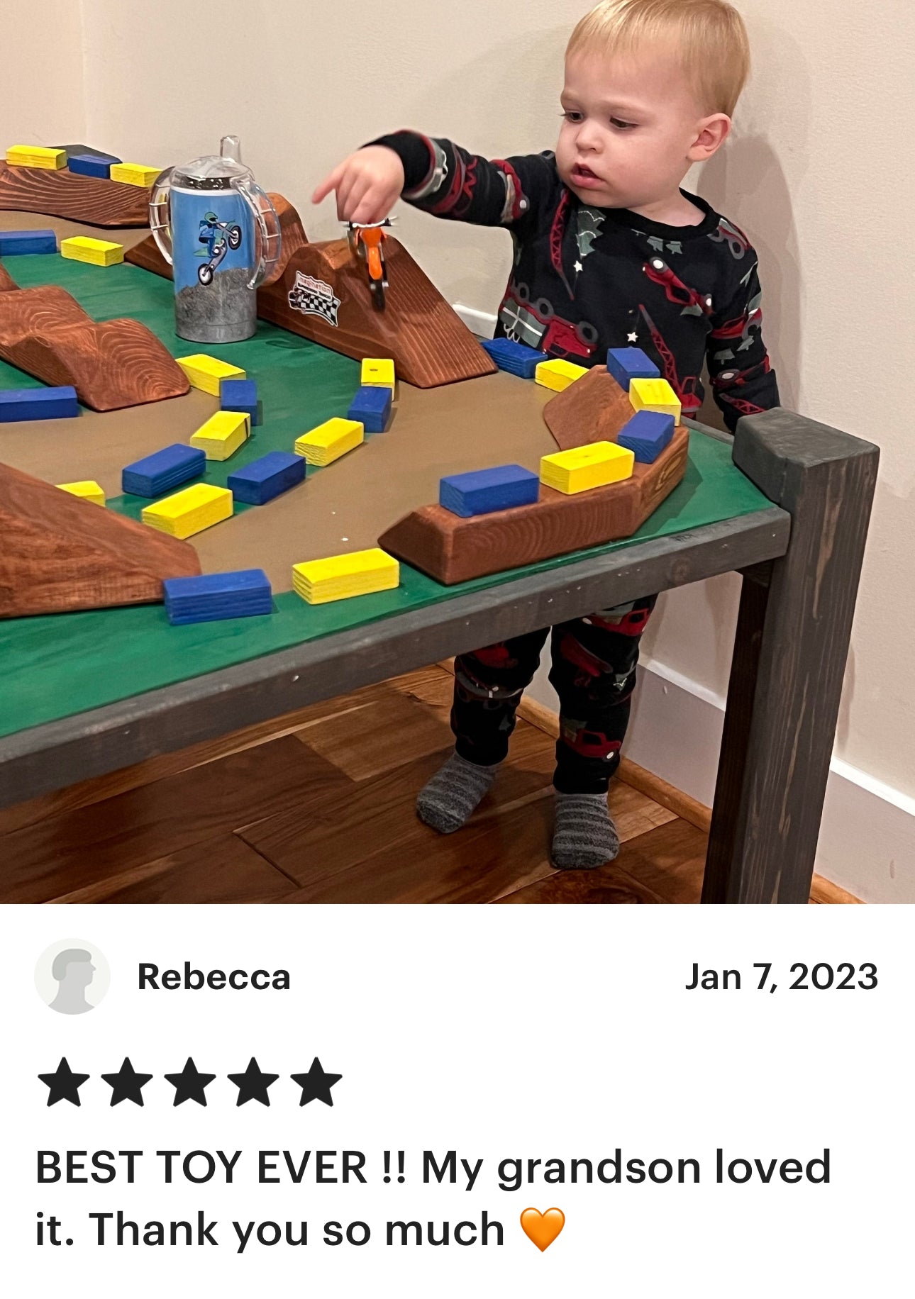 Clild playing with dirtbikes in the dirt, with freestyle ramp, five star review
